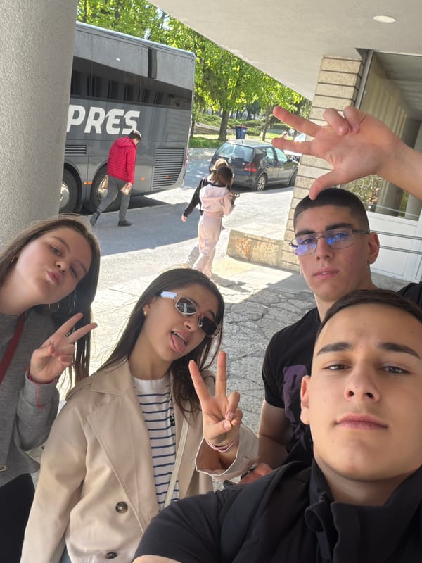 Friends pose for photos near bus in Shumen