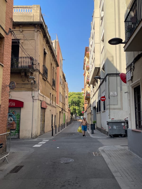 Barcelona street textures and neighborhood details on a sunny morning