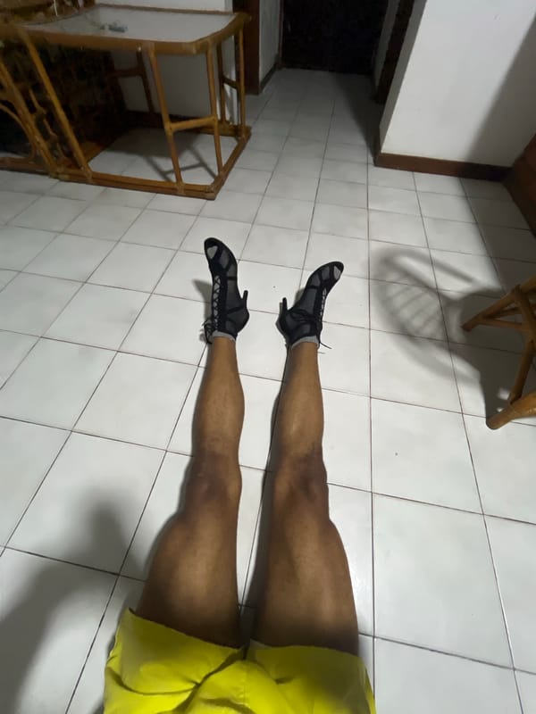 Man performs gymnastics routine in heels in Porlamar home