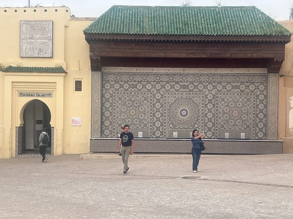 Street scenes documented in Meknes, Morocco under cloudy skies