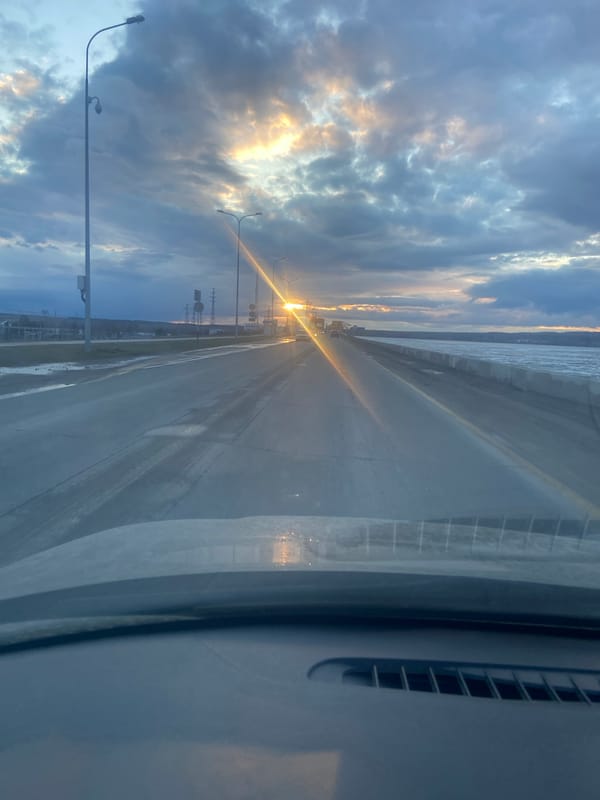 Afternoon activities documented along waterway in Chaikovsky, Russia