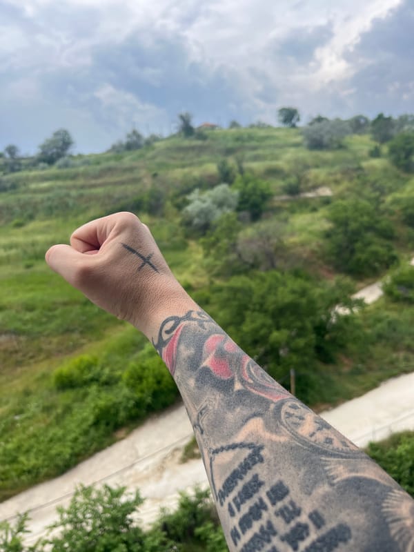 Tattooed fist with cross displayed in Varna, Bulgaria