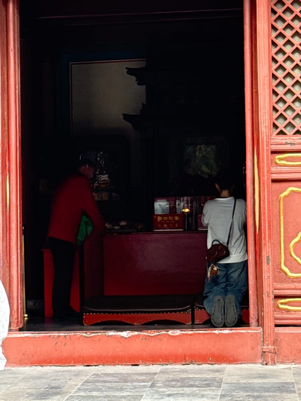 Morning worship rituals observed at Beijing's Lama Temple