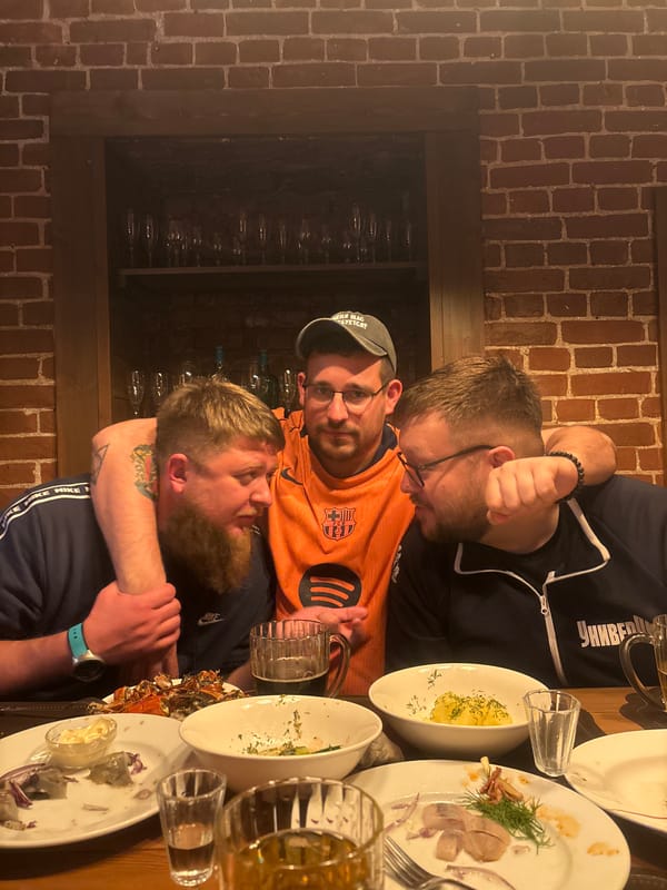 Three men finish meal at Krasnoyarsk restaurant
