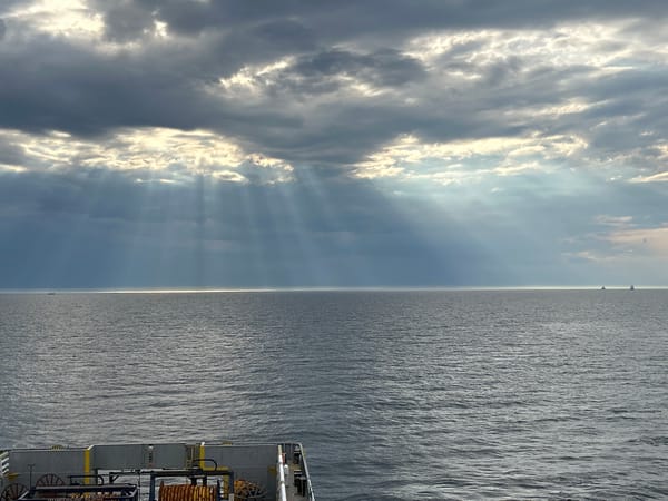Dramatic clouds captured over Baltic waters from ship bow
