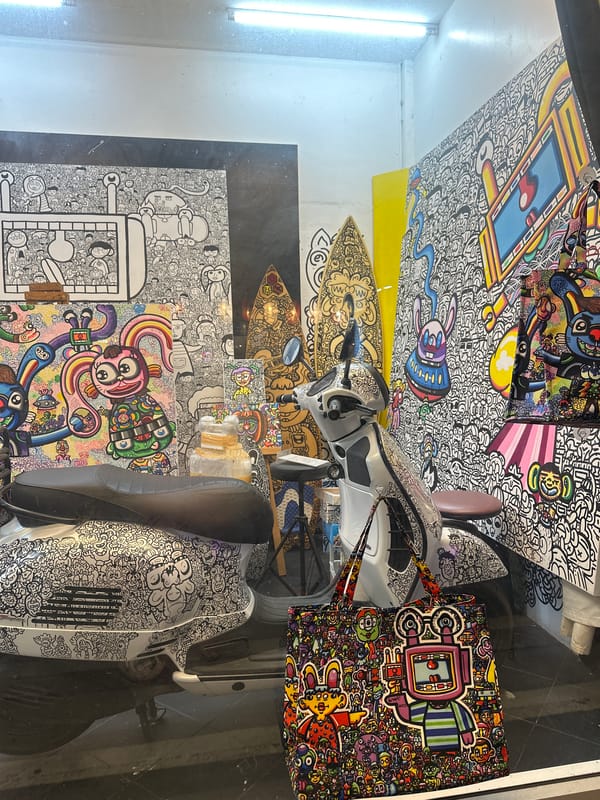 Scooter parked in doodle art shop, Baan Lamai Thailand