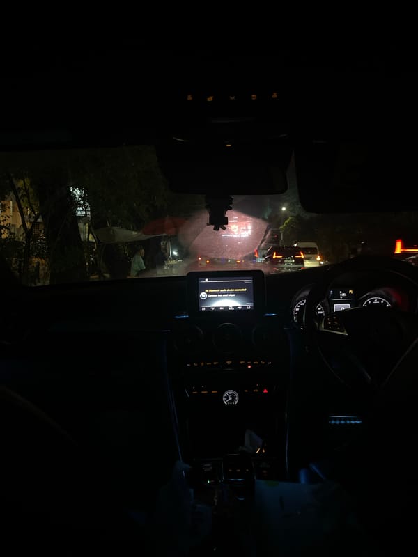 Nighttime drive through Bogor captured from inside vehicle