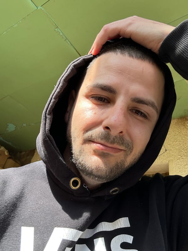 Man takes selfie in black hoodie in Slavyani, Bulgaria