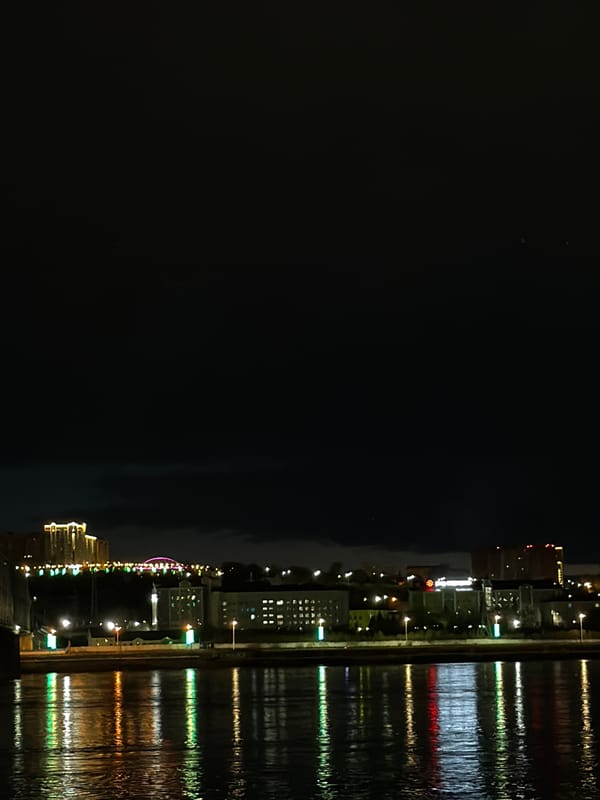 Krasnoyarsk skyline reflected in Yenisey River at night