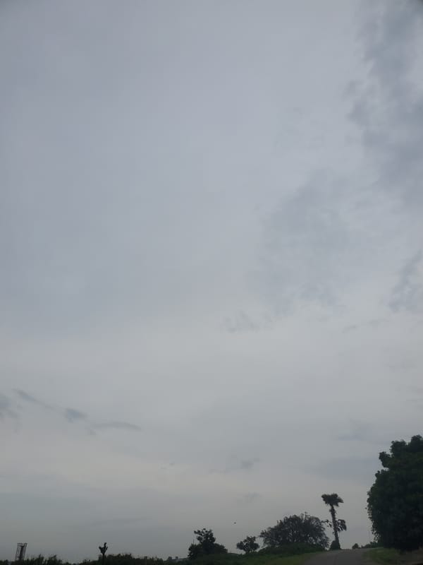 Overcast afternoon walk through Jos Nigeria's mixed urban landscape