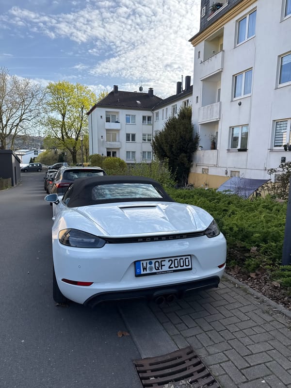 Porsche illegally parked on Wuppertal sidewalk