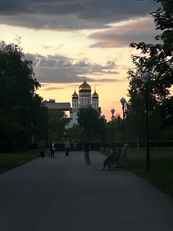 Two women take sunset selfies in Tolyatti, Russia