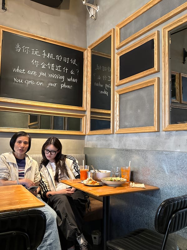Women share green smoothies at early morning cafe in Yuzhong