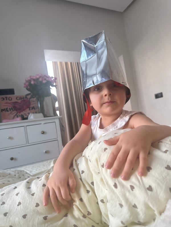 Young child captured in casual indoor moments in Khimki