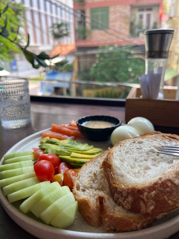 Morning breakfast photographed with city view in Nha Trang