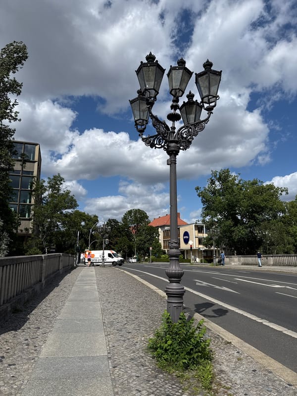 Midday snapshots along Berlin's riverside streets and buildings