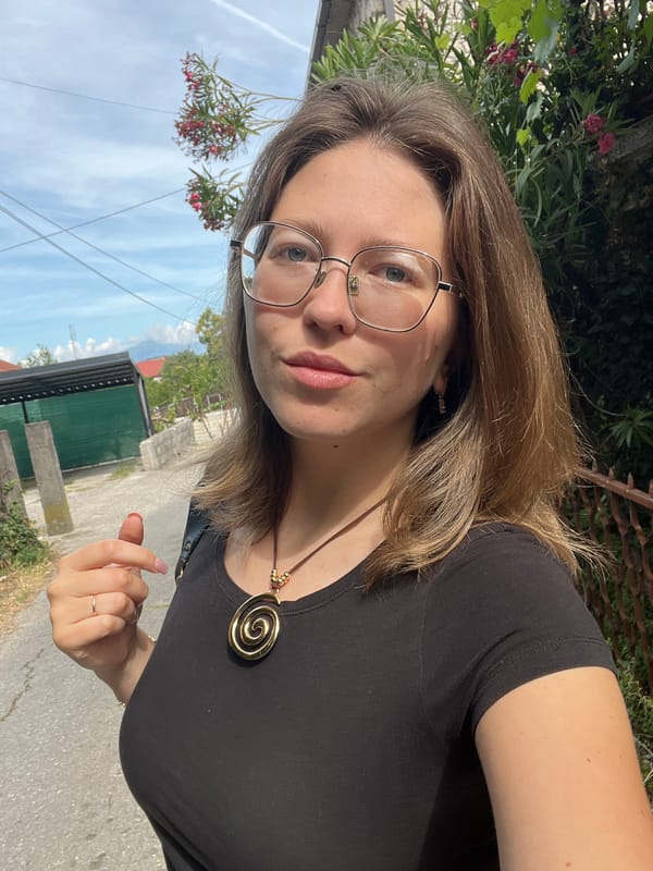 Woman takes morning selfies on Podgorica dirt path