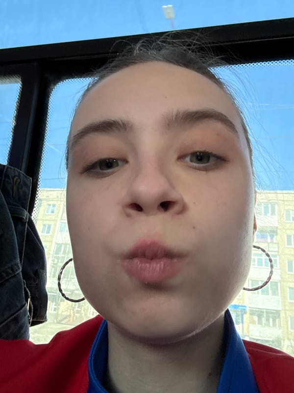 Person takes selfie inside vehicle on April 12