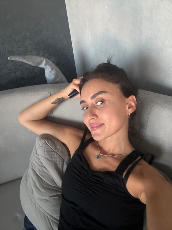 Casual selfie session on a Tbilisi apartment sofa