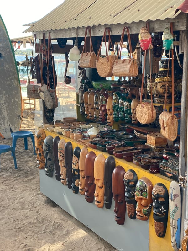 Beach bars, dive shops, and cidomo carts on the Gili Islands