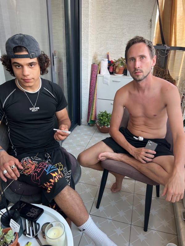 Balcony hangout in Kiryat Bialik, cigarettes and phones