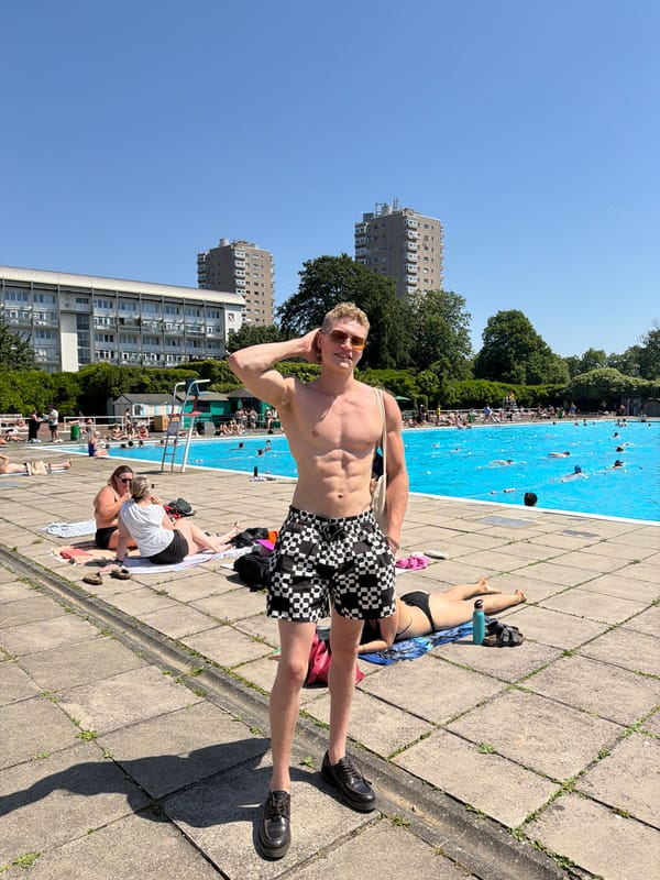Londoners enjoy sunny day at outdoor lido pool