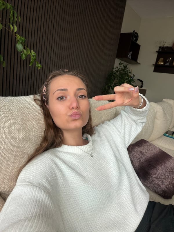 Woman poses for indoor photos in Buhovo home