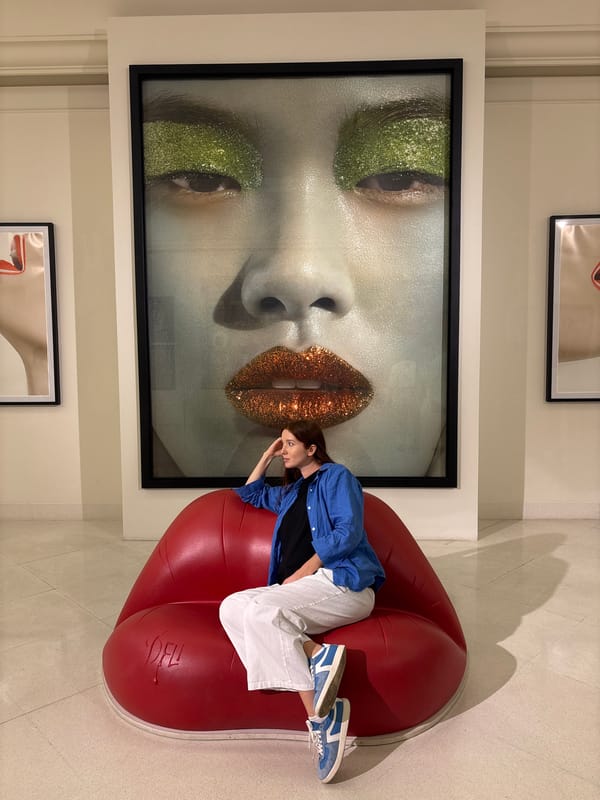 Art gallery visitors view paintings and sculptures in Bangkok