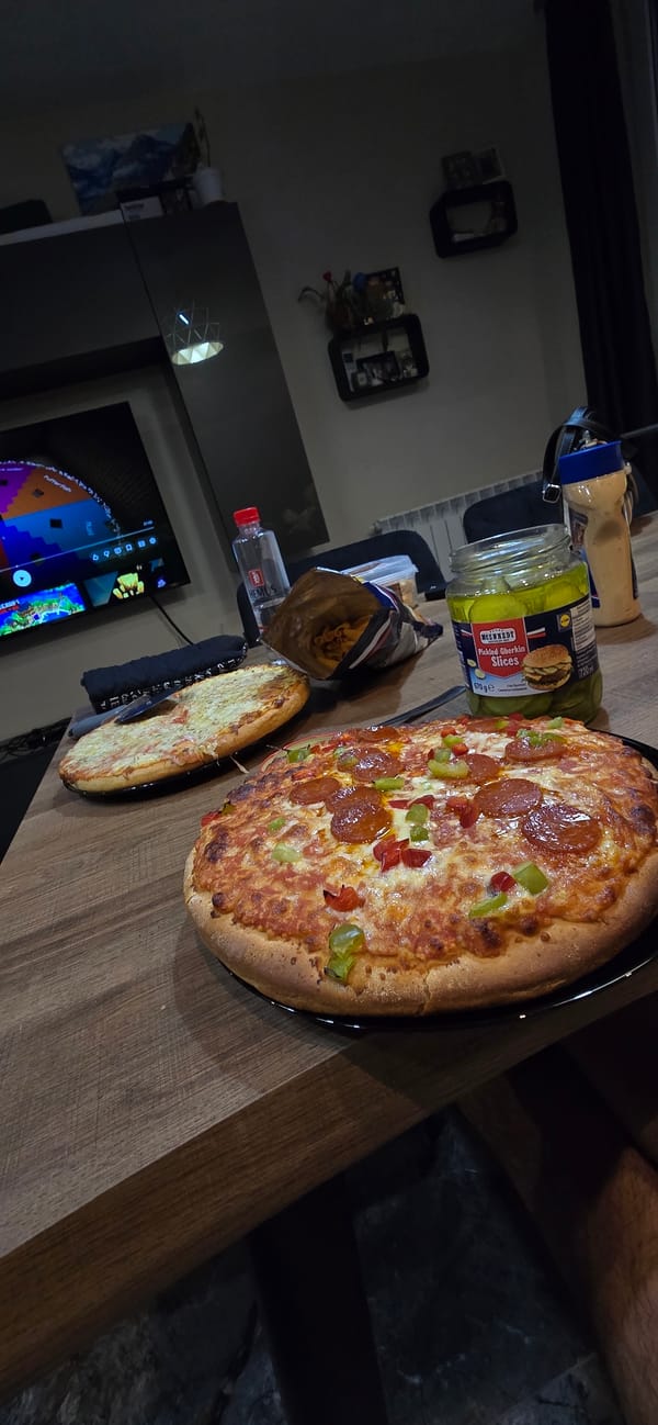 Pizza night and cat play in a Vratsa home