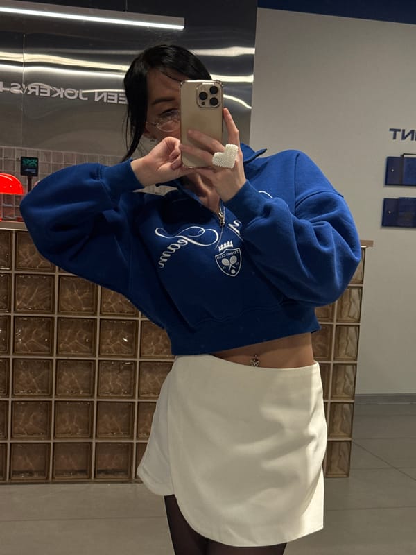 Woman takes selfies while shopping in Krasnoyarsk store