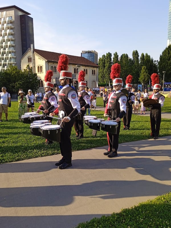Marching band performs in Milan's Porta Nuova district