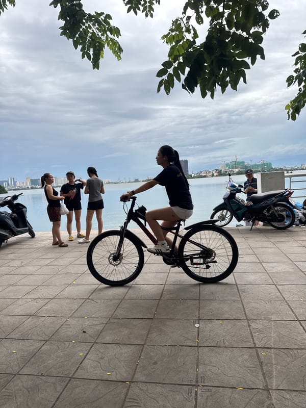 Everyday life along Hanoi's West Lake promenade