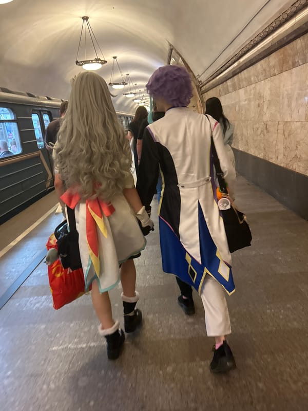 Cosplayers and street scenes near ornate Moscow-style architecture