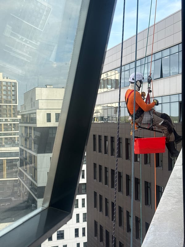 Window cleaner rappels down Yekaterinburg office building