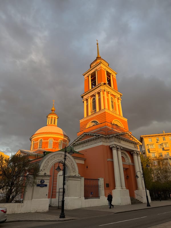 Moscow street scene captured during dramatic golden hour lighting