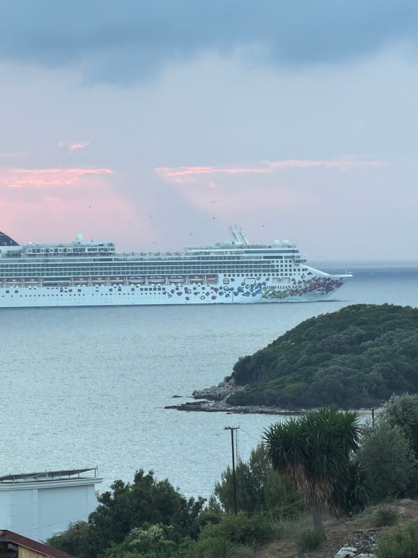 Two cruise ships anchor off Albanian coast during sunset
