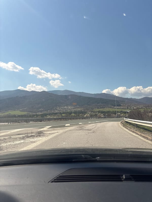 Driver captures mountainous road view near Razliv, Bulgaria