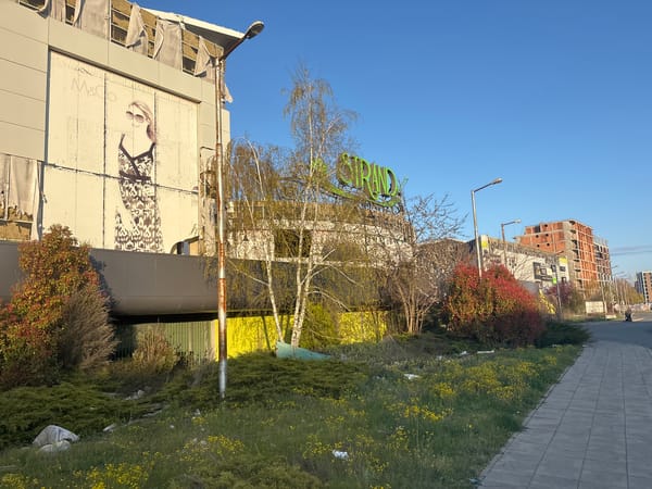 Peace sign gesture captured near abandoned mall in Burgas
