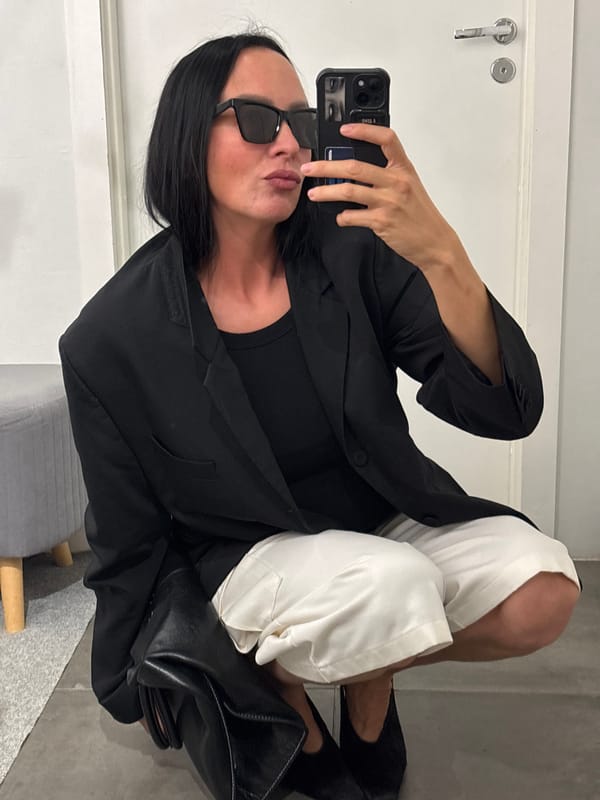 Woman documents outfit styling session across Chaikovsky locations