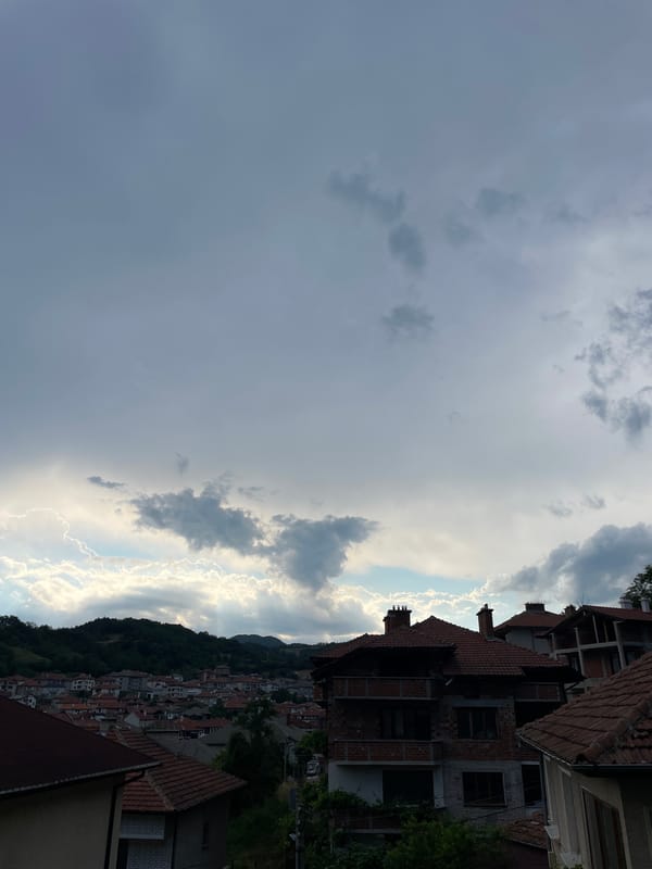 Rooftop views across Zlatograd on a changeable June afternoon