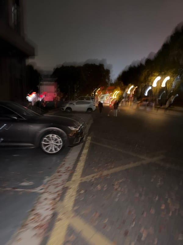 Nighttime street parking scene captured in Jiangning District