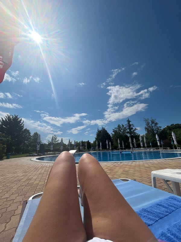 Lazy afternoon at a hotel pool on a sunny day