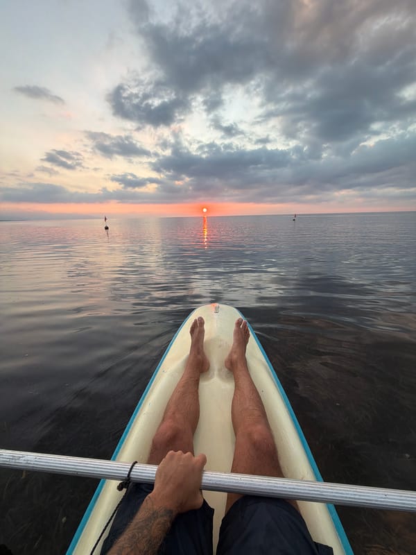 Paddleboarding and kayaking at sunrise off Buleleng coast