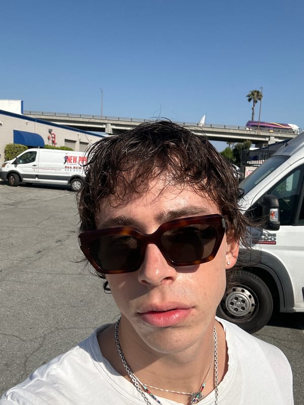Person photographed smoking cigarette in Glendale parking lot