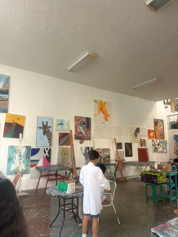 Child visits artist studio in San Bernardino Tlaxcalancingo