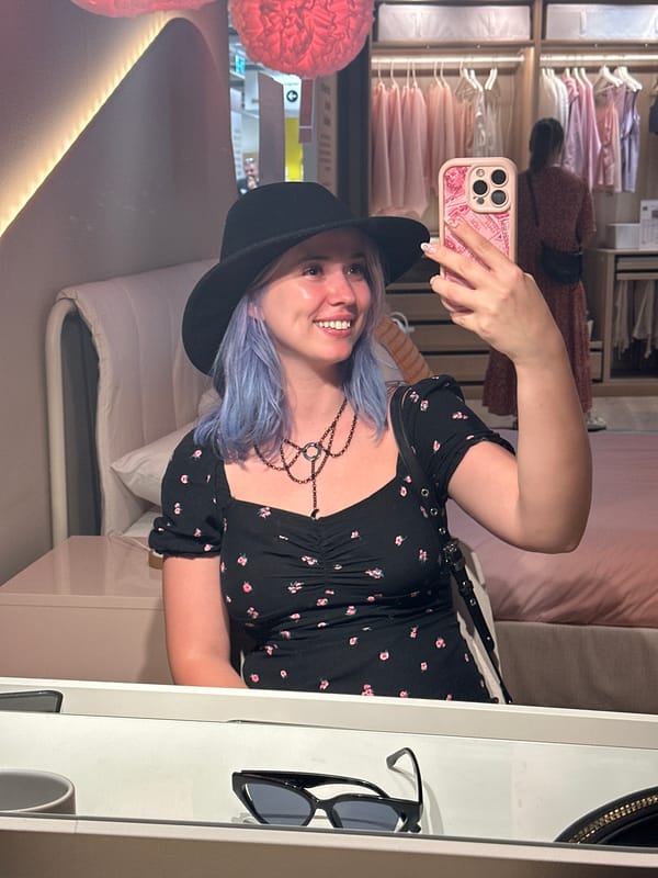 Woman documents afternoon furniture shopping trip at Spanish IKEA