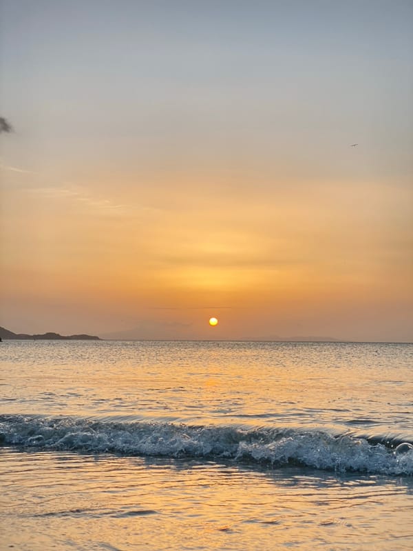 Evening sunset gathering documented in Juan Griego, Venezuela