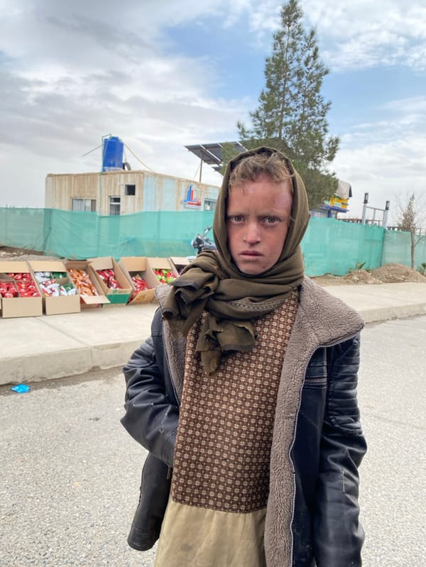 Children observed near white vehicle in Kandahar