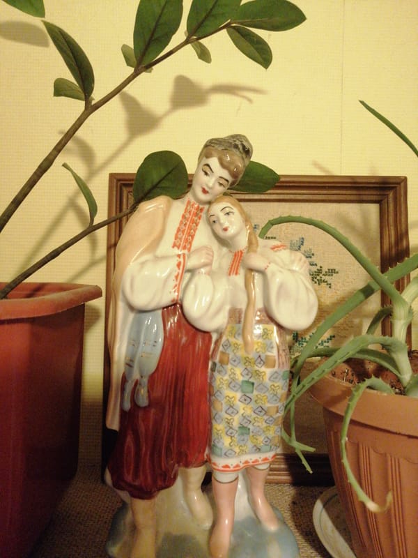 Home scenes documented in Pavlodar featuring cultural art, sleeping cat
