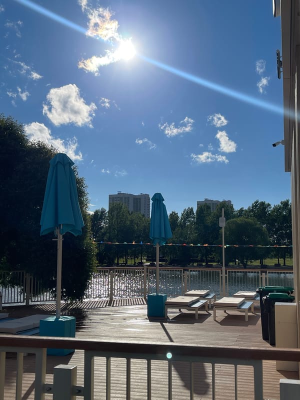 Moscow lakeside park on a bright summer afternoon